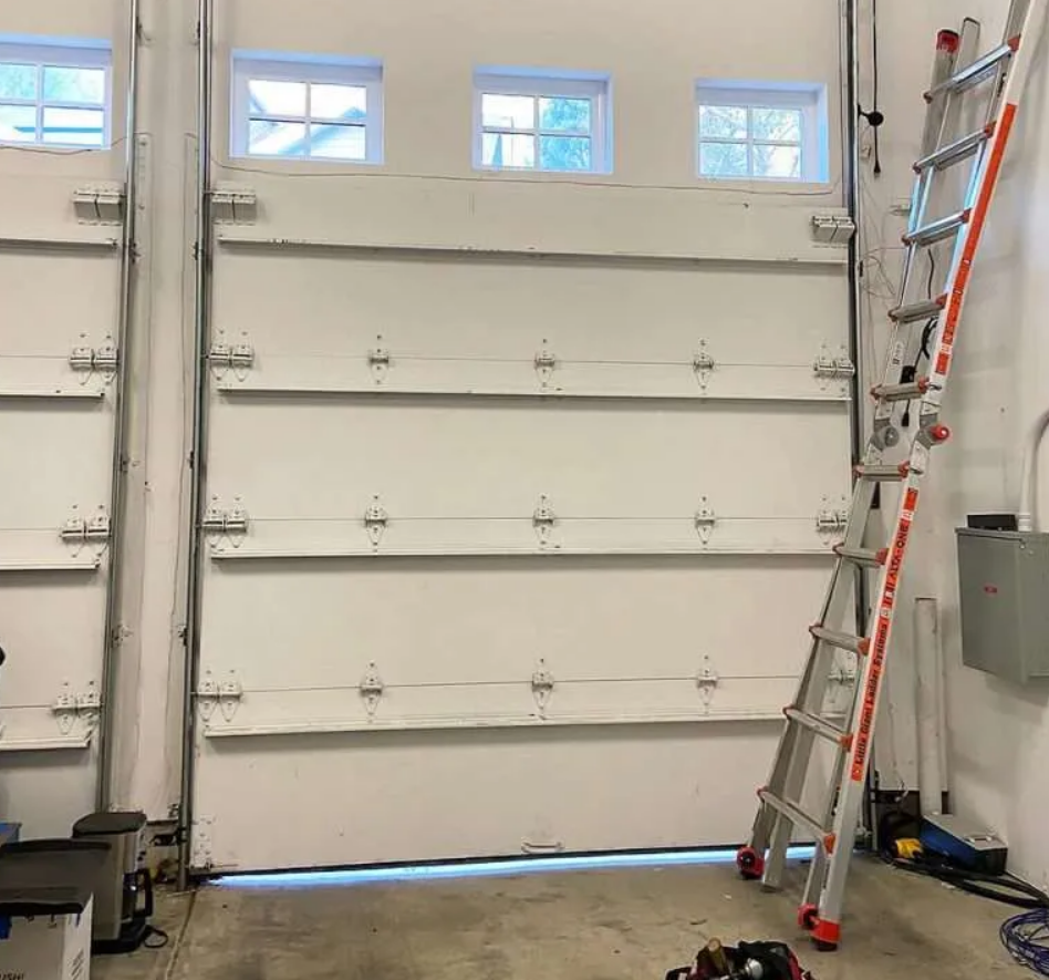 Professional overhead garage door repair service in Orlando, FL by Orlando FL Quick Garage Door and Gate Repair, featuring expert technicians ensuring smooth and reliable operation.
