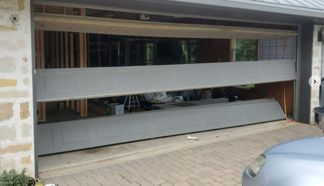 Professional garage door section replacement service by Orlando FL Quick Garage Door and Gate Repair