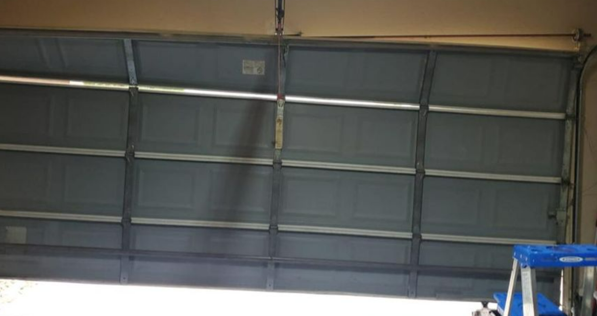 Garage door replacement service in Orlando, FL by Orlando FL Quick Garage Door and Gate Repair