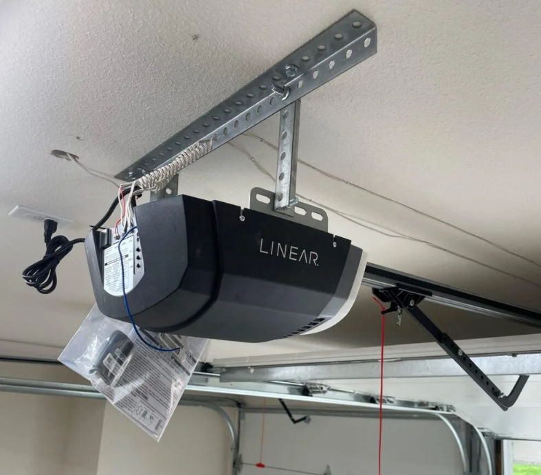 Alt text: "Garage door opener repair services in Orlando, FL by Quick Garage Door and Gate Repair - Reliable and professional solutions for all your garage door needs."