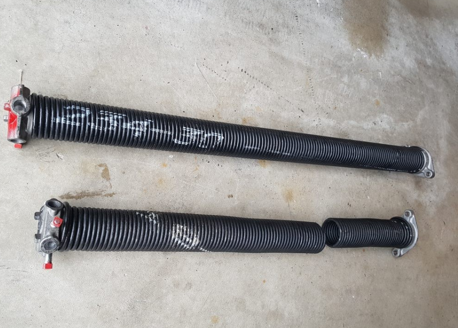 Alt text: "Professional garage door spring repair service provided by Orlando FL Quick Garage Door and Gate Repair, ensuring smooth and safe operation of your garage door system."