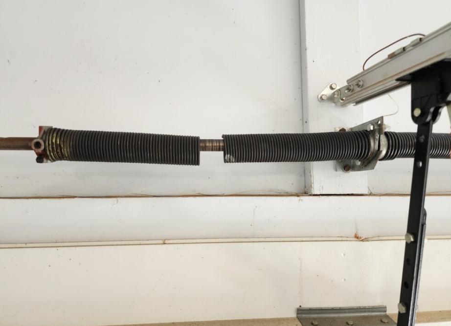 Alt text: "Professional garage door spring repair service in Orlando, FL provided by Orlando FL Quick Garage Door and Gate Repair, ensuring safe and efficient operation."
