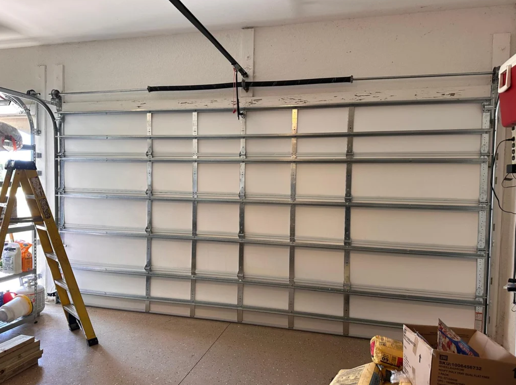 Orlando FL Quick Garage Door and Gate Repair expert technician providing residential garage door spring repair and opener service near UCF and Baldwin Alafaya, Florida.