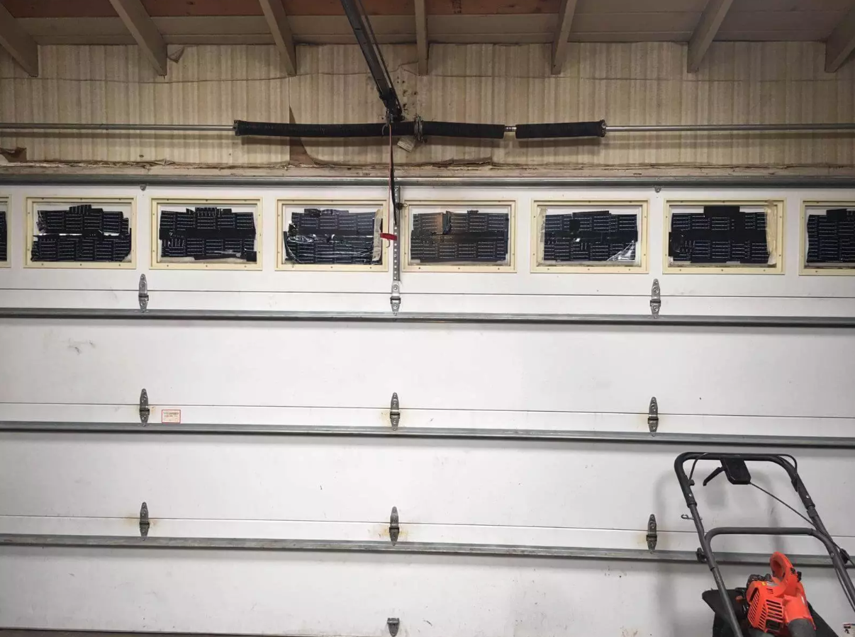 Orlando FL Quick Garage Door and Gate Repair expert technician providing residential garage door spring repair and opener service in Kissimmee and Celebration, Florida.